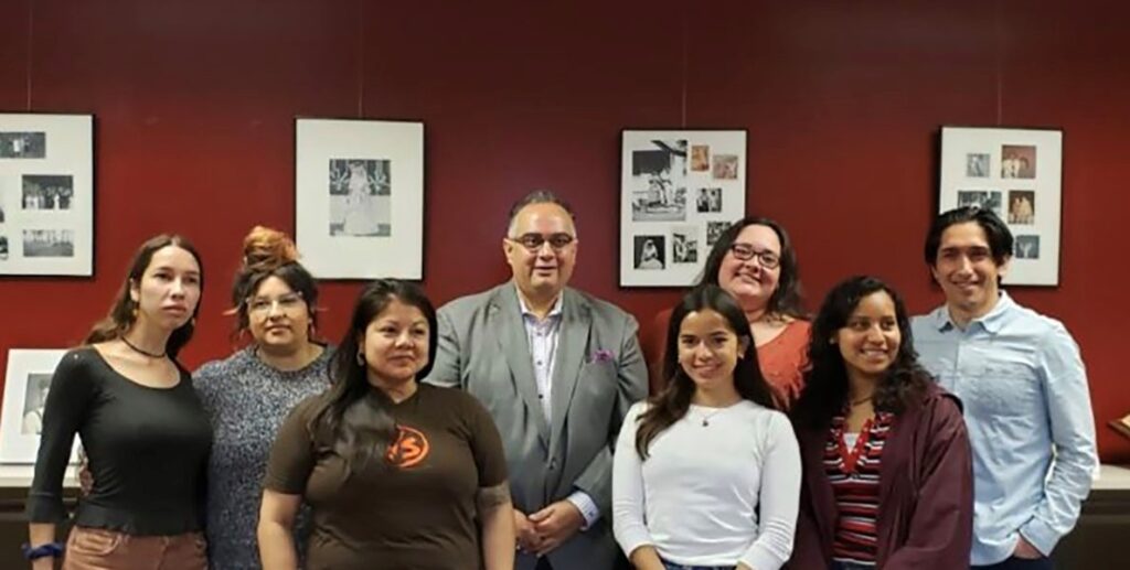 Group photo of University of California Regent John Pérez with eight people during a visit to the CSRC in 2019.